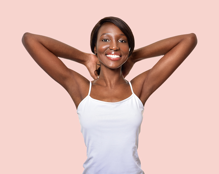Beautiful African American woman smiling after a body wax service